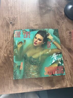The Life of a Showgirl Vinyl LP - Turquoise Cover with Coral Text